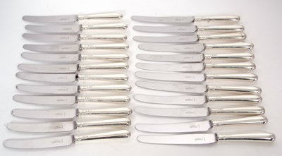 Lot 135 - Twelve silver handled table knives, Sheffield...