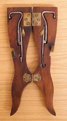 Lot 107 - A novelty cased pair of button hooks, the...