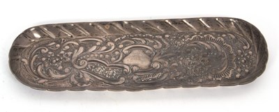 Lot 175 - An Edwrdian silver embossed pen tray...