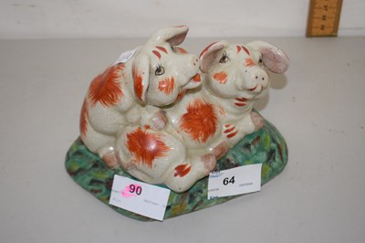 Lot 64 - Staffordshire style model of pigs