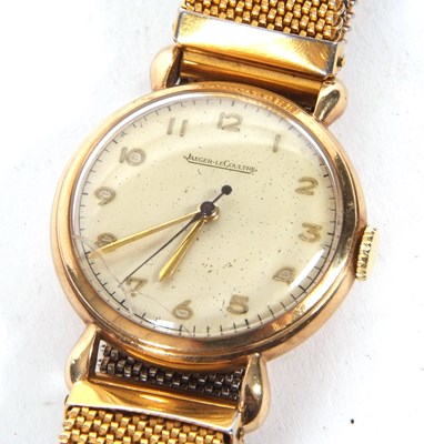Lot 219 - A gents 9ct gold Jaeger Le Coutre watch on an...