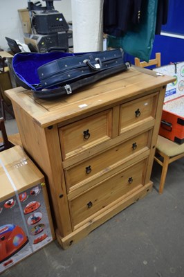 Lot 833 - A modern pine chest of drawers, two short over...