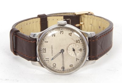 Lot 423 - A vintage Longines gents wristwatch, the watch...