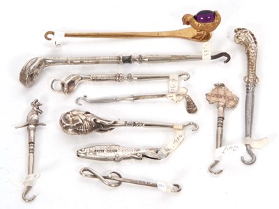 Lot 238 - A group of ten novelty button hooks to include...