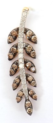 Lot 176 - A 9ct brown and white diamond leaf pendant,...