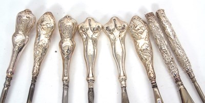 Lot 159 - Four pairs of silver handled button hooks and...