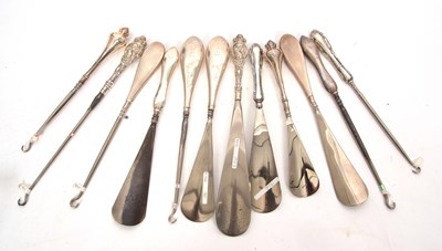 Lot 166 - Six pairs of silver handled shoe horns and...