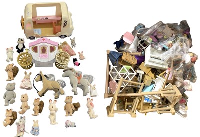 Lot 211 - A collection of various Sylvanian Families...