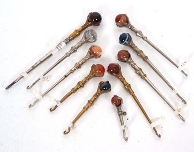 Lot 300 - A group of ten vintage agate and claw handled...