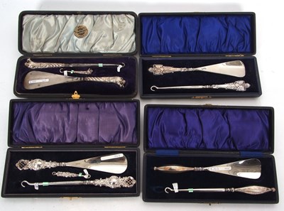 Lot 333 - Four cased button hook and shoe horn sets,...