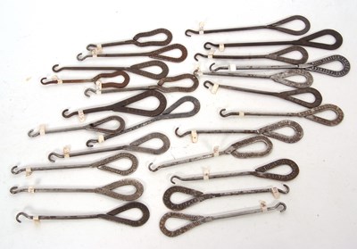 Lot 185 - Group of steel advertising button hooks circa...