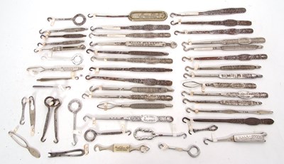 Lot 167 - Quantity of steel advertising button hooks to...