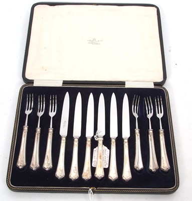 Lot 369 - Cased set of six pairs of silver handled fruit...