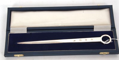 Lot 376 - Cased Elizabeth II silver meat skewer/paper...