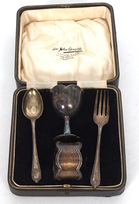 Lot 383 - A cased christening egg cup and serviette ring...