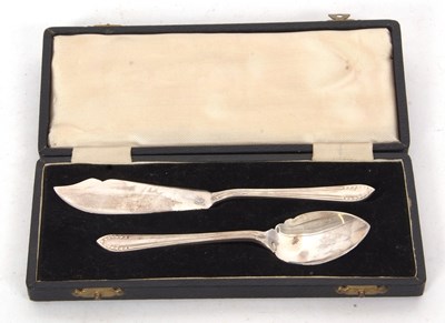 Lot 385 - A cased George VI silver spoon and butter...