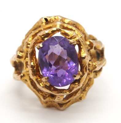 Lot 75 - A mid 20th century 9ct amethyst ring, the oval...