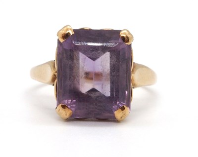 Lot 63 - An amethyst ring, the emerald cut amethyst, in...