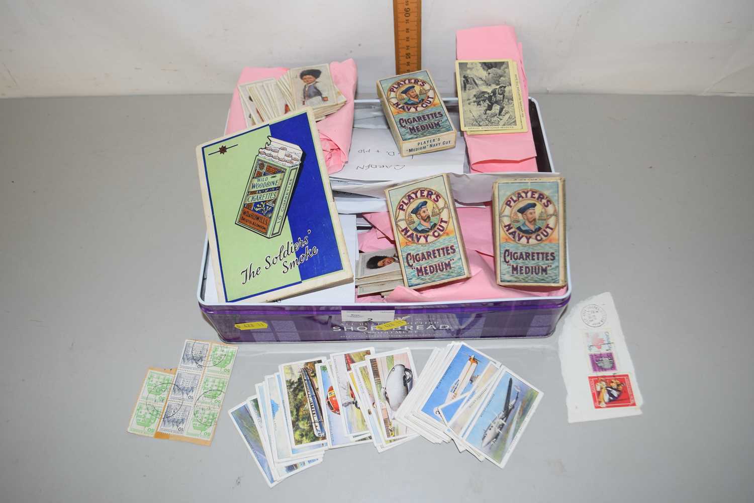 Lot 2 - A tin of assorted cigarette cards