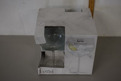 Lot 8 - A boxed set of four Waitrose Home gin goblets