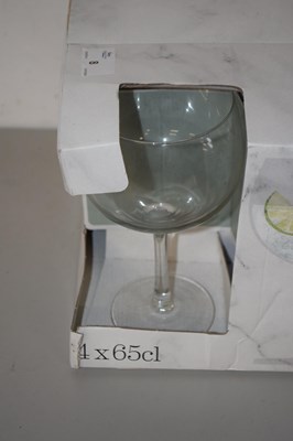Lot 8 - A boxed set of four Waitrose Home gin goblets