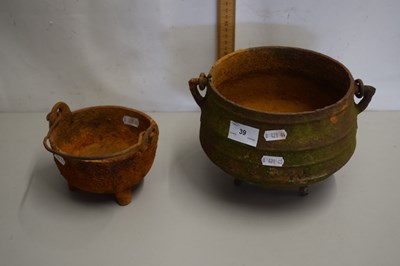 Lot 39 - A pair of small iron cauldron type cooking pots