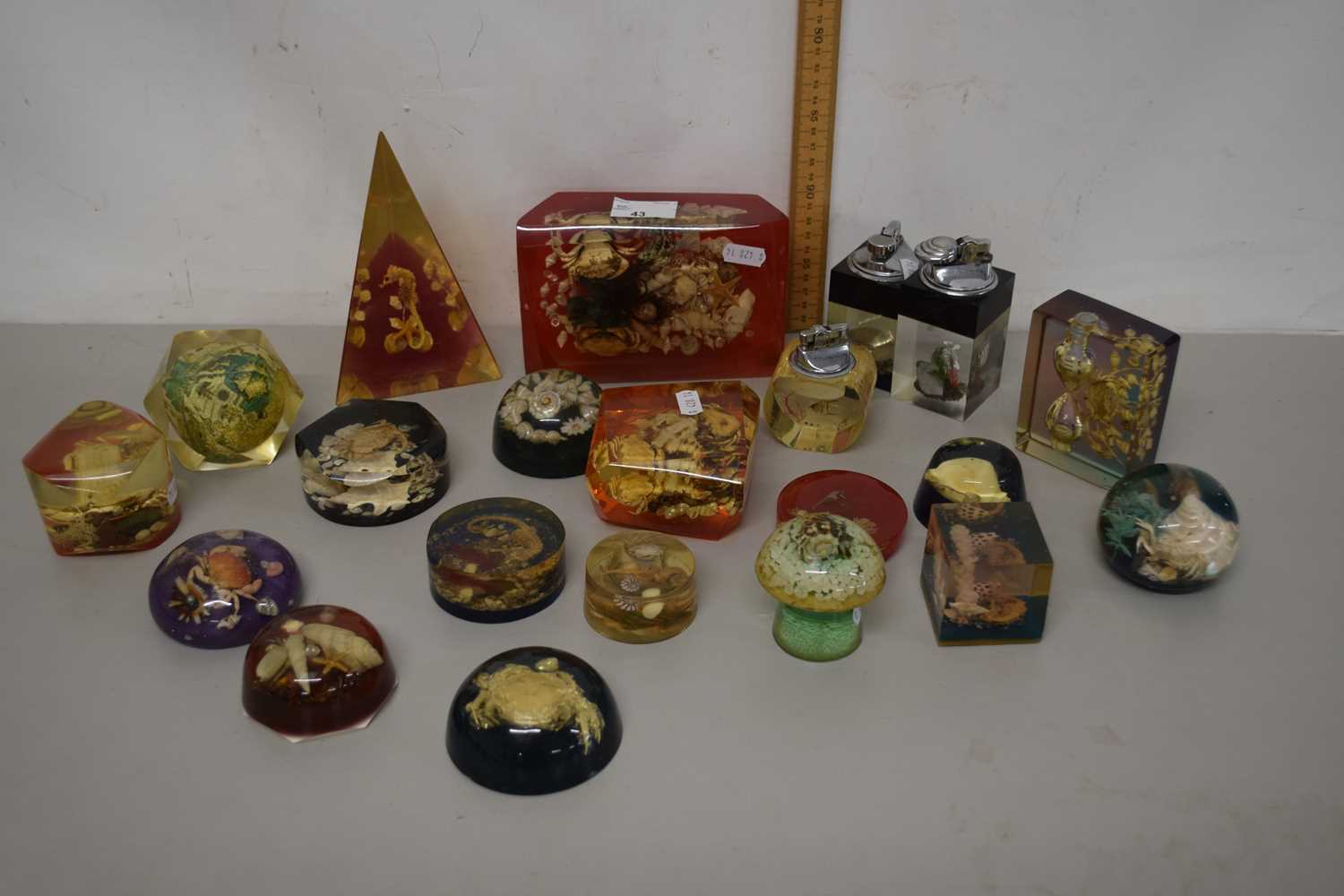 Lot 43 - A collection of various resin paperweights...