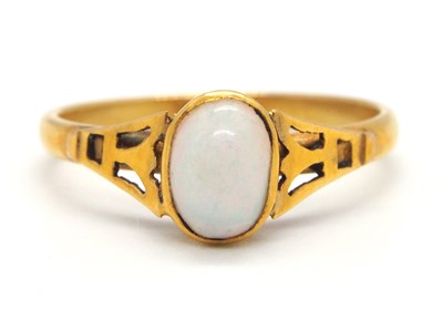 Lot 13 - An opal ring, the oval opal cabochon, collet...