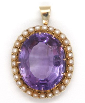 Lot 100 - A 15ct amethyst and split pearl pendant, the...