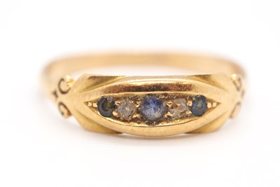 Lot 48 - A five stone sapphire and diamond ring, the...