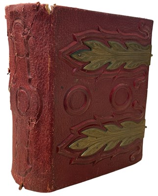 Lot 455 - A small red leather and brass Victorian...