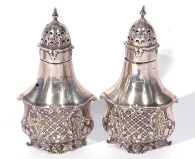 Lot 204 - Pair of Edward VII silver pepperettes of...