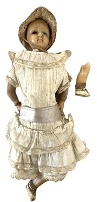 Lot 173 - An antique doll with wax head, shoulders and...