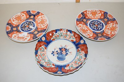 Lot 71 - Pair of Imari pattern circular plates plus...