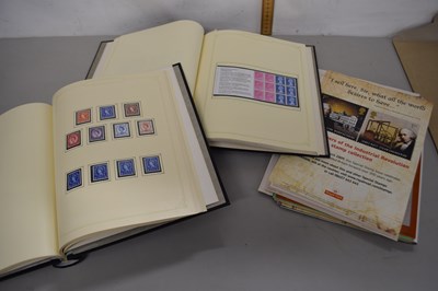 Lot 81 - Two albums containing a collection of Queen...