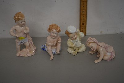 Lot 97 - Collection of four Royal Doulton models of babies