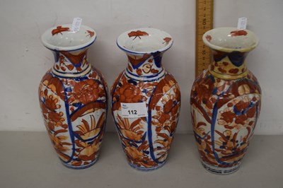 Lot 112 - Set of three Japanese Imari vases