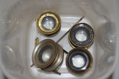 Lot 131 - Box of brass mounted lenses