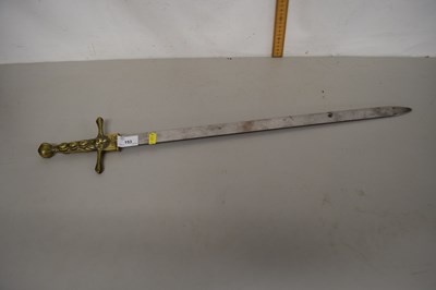 Lot 153 - A reproduction brass handled sword, display...