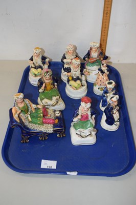 Lot 198 - Collection of Staffordshire figures and pen...