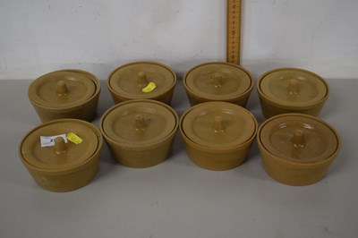 Lot 221 - Set of eight Holkham Pottery covered ramekin...