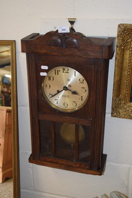 Lot 295 - An early 20th Century oak cased mantel clock