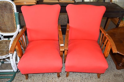 Lot 357 - A pair of Art Deco style red upholstered...