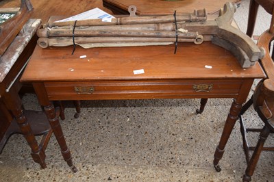 Lot 381 - Victorian American walnut single drawer side...