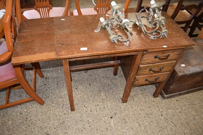 Lot 410 - A small 20th Century oak desk