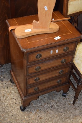 Lot 437 - A reproduction mahogany veneered four drawer...