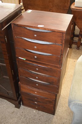 Lot 447 - Three 20th Century stained pine three drawer...