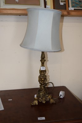 Lot 455 - A 20th Century table lamp with cast brass...