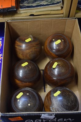 Lot 565 - Box of wooden lawn bowls