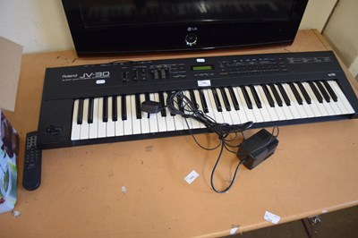 Lot 754 - A Roland JV30 keyboard and AC adaptor